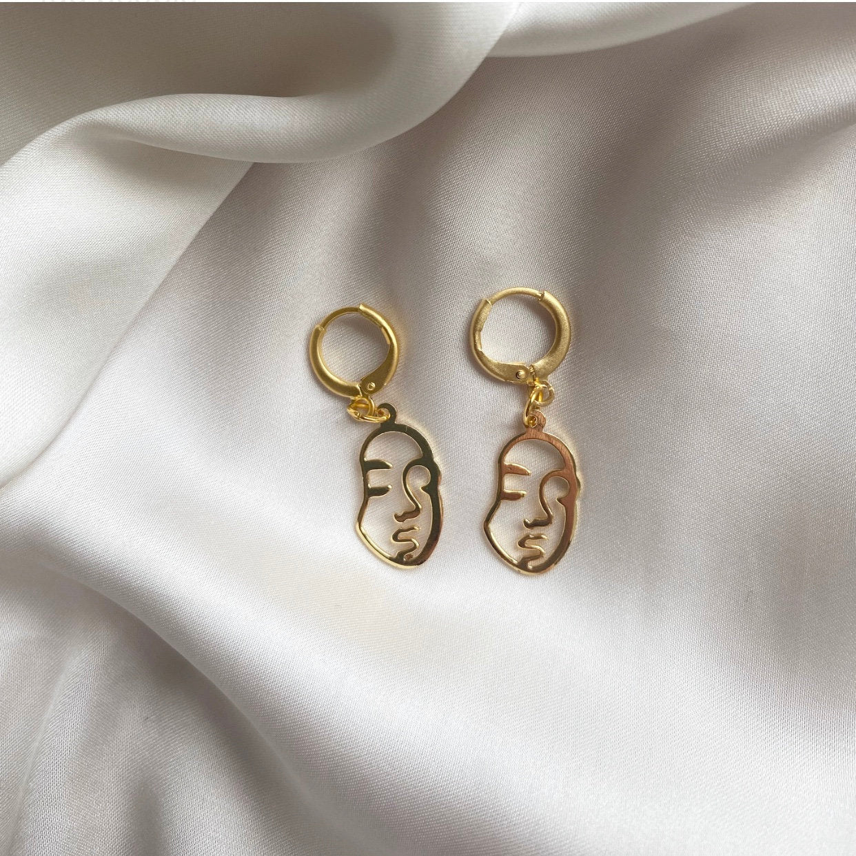 Fab face earrings | Real Divas are LARGE!